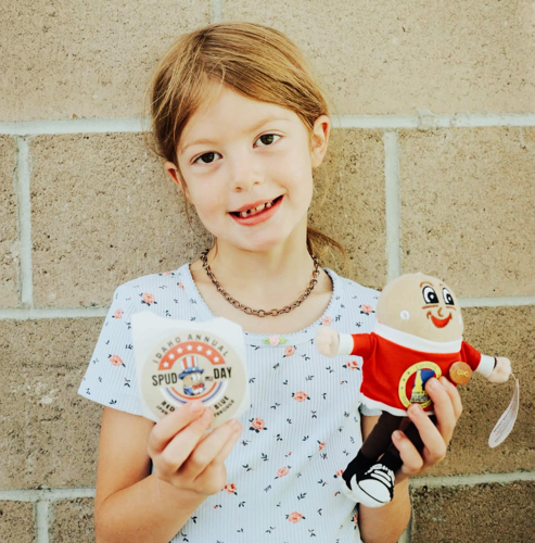girl with spuddy.png
