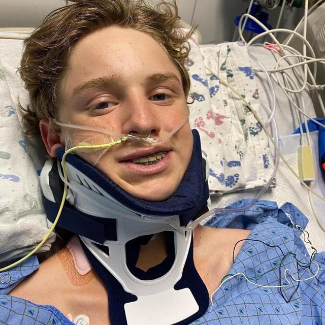 16-year-old Jacob Rasmussen in the hospital in a neck splint