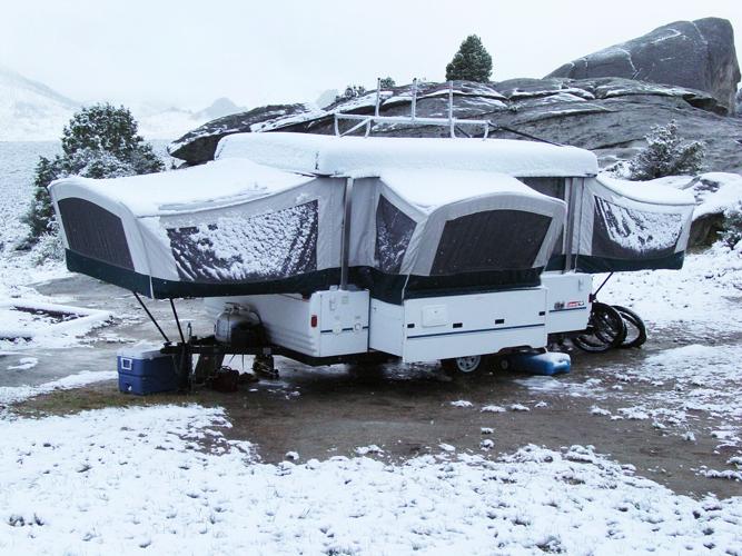 Tent trailer camping in snow at City of rocks