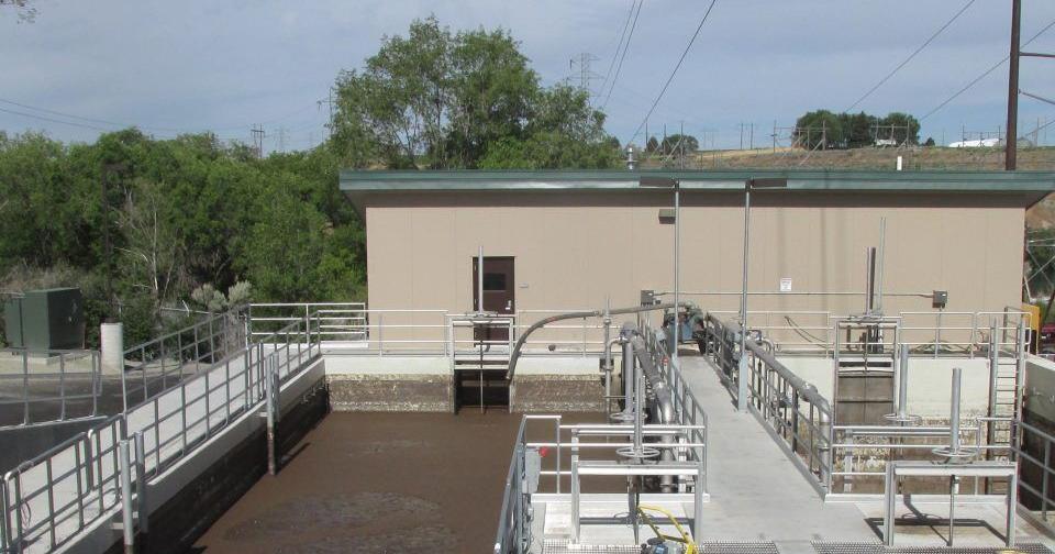 American Falls sewage overflow spills into parking lot, river below ...