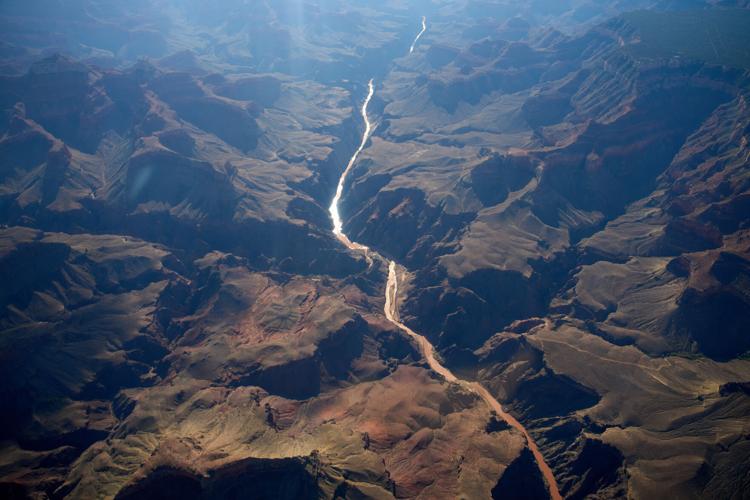 Deadly flash flood forces Grand Canyon evacuations and water restrictions, in photos
