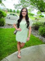 Dress gets West Side High senior in trouble