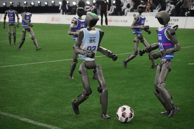 Humanoid robots sprint, play soccer and set records at Beijing games, in photos