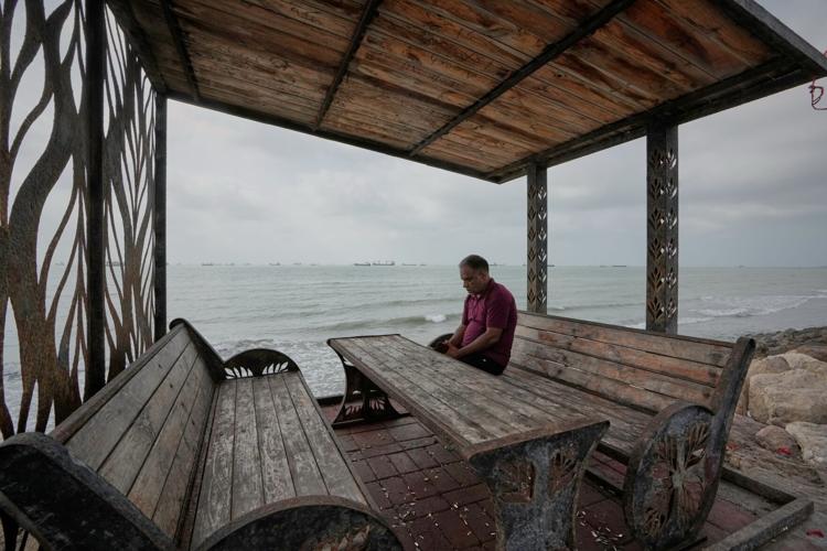 Photos show daily life in Iran on the beach along the Strait of Hormuz