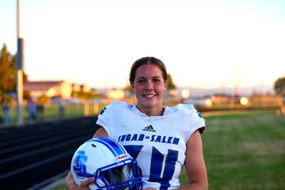 Sugar-Salem senior place kicker Sunny Bennion poses for a photo after helping the Diggers' beat Shelley Friday in her first game with the Diggers