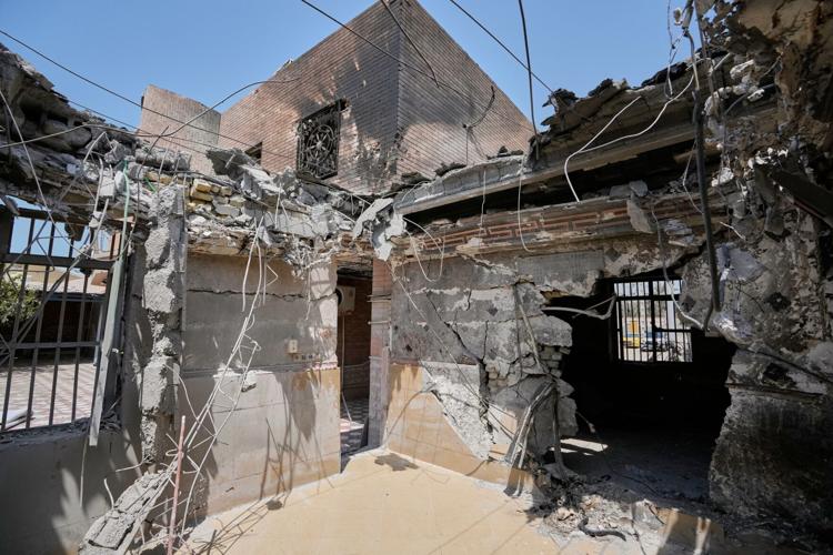 Photos show destruction and mourning after a strike on an Iranian wedding