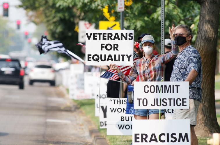Capital Sign Wavers