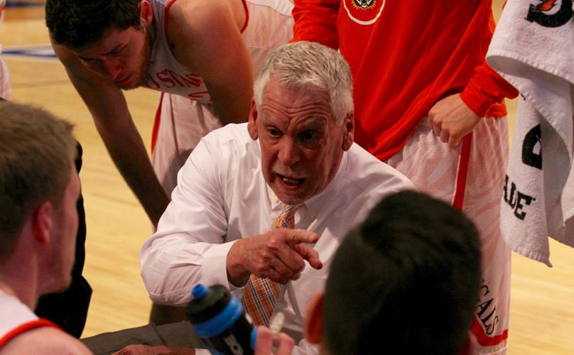Bill Evans coaching on bench.jpg