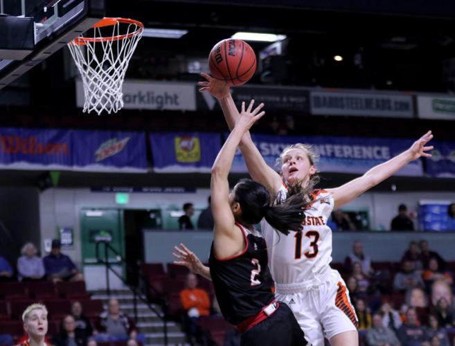 Ellie Smith block shot on Rebecca Cardenas.jpg