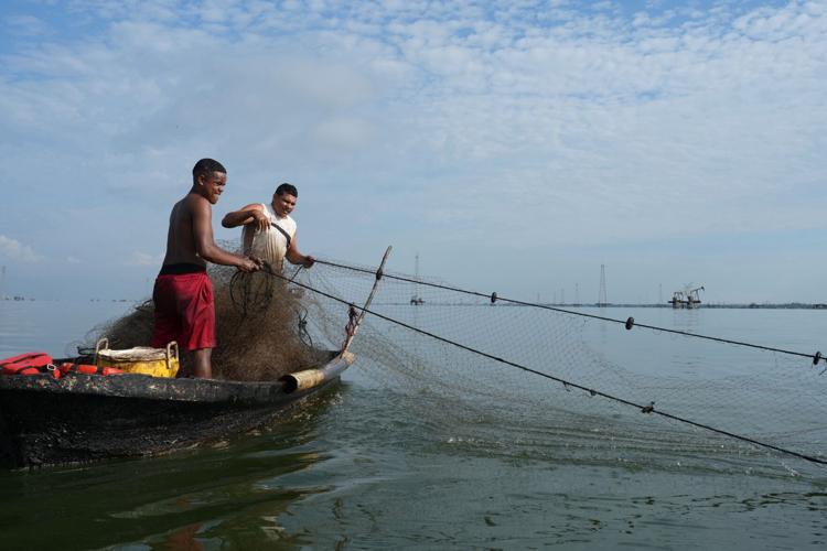 Photos show broken oil infrastructure and blackouts on Venezuela's Lake Maracaibo