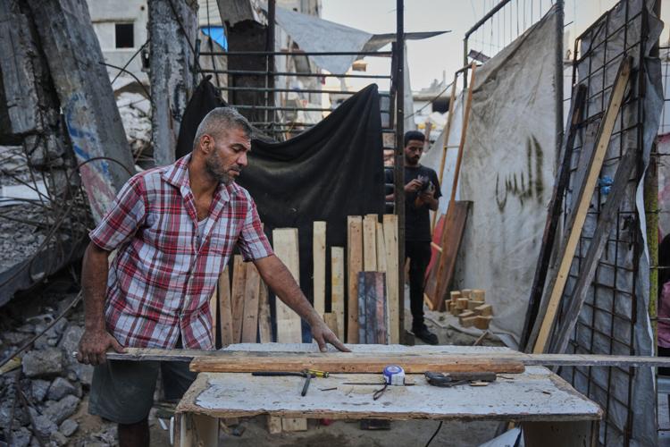 Photos show Palestinians using handmade mud bricks, wood and plastic to rebuild amid Gaza’s rubble