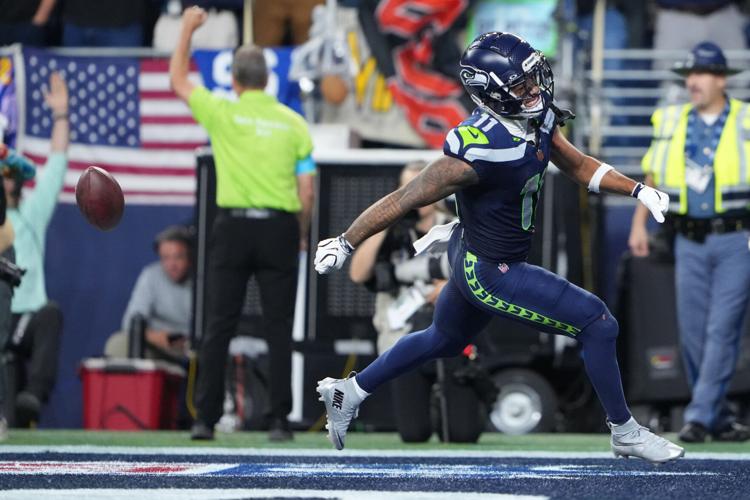 Photos of the NFL season opener, a rare Super Bowl rematch between the Seahawks and Patriots