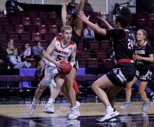 Dora Goles drives baseline.jpg