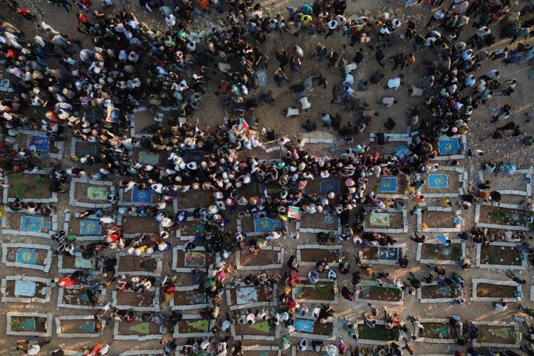 Photos of the funeral for victims of a deadly prison fire and riot in northern Syria