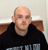 Man accused of shooting at officers waives hearing