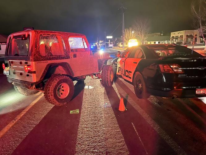 Jeep crashes into police car