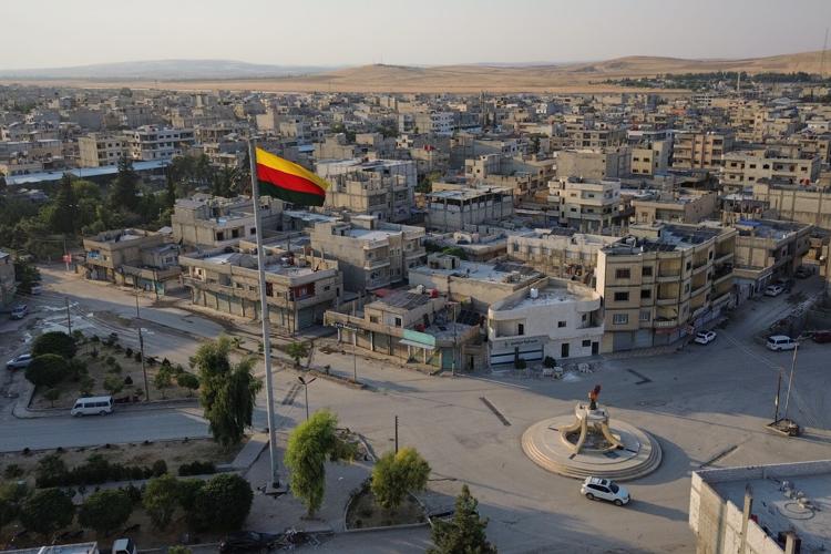 Photos of the funeral for victims of a deadly prison fire and riot in northern Syria
