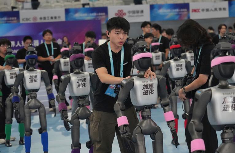 Humanoid robots sprint, play soccer and set records at Beijing games, in photos