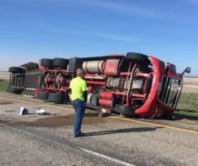 Winds cause semi to tip over