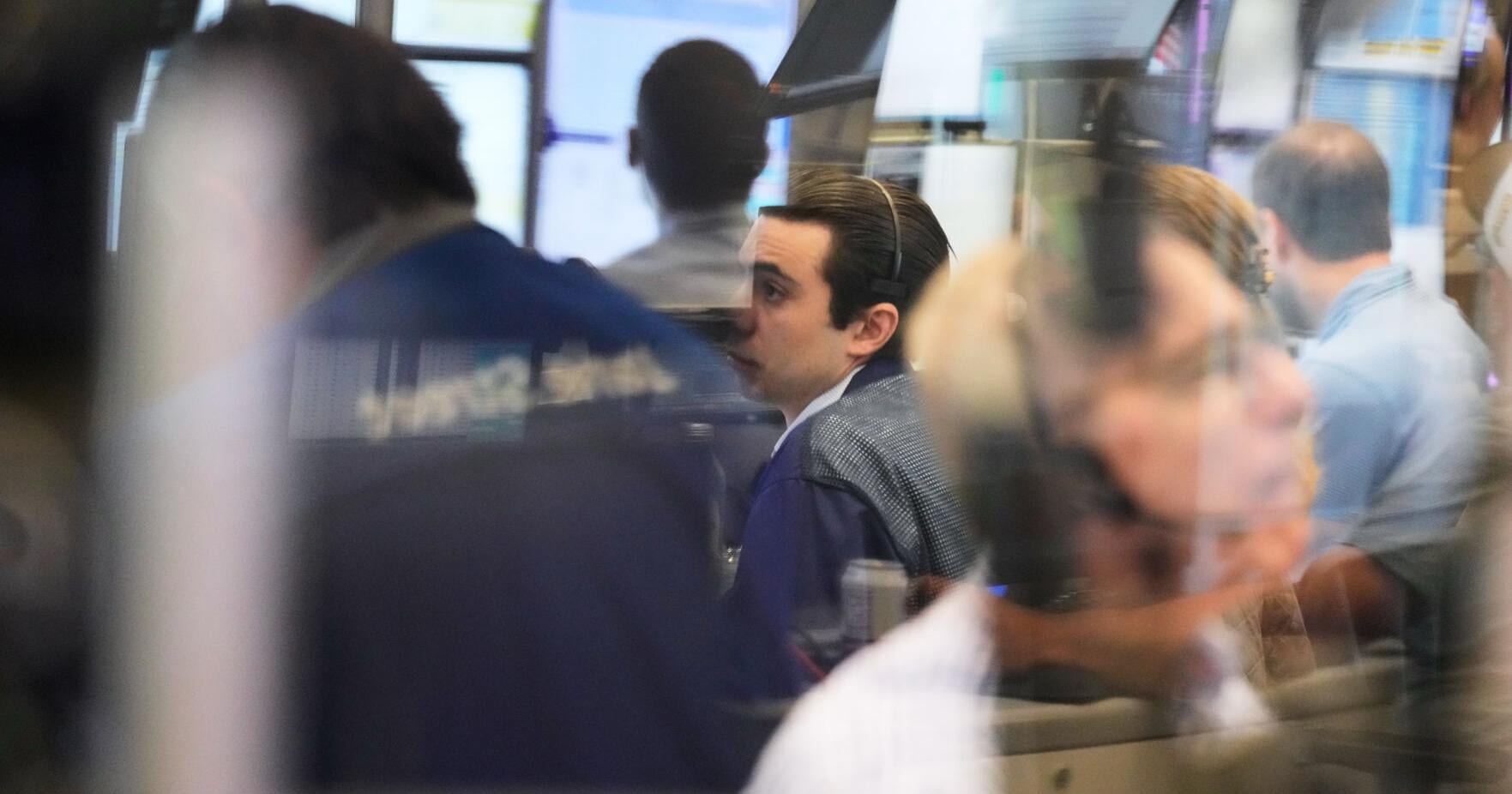 Swings in the bond market shake stock markets worldwide , as AI optimism supports Wall Street