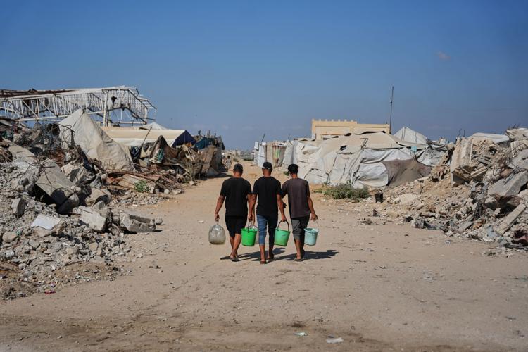 Photos show Palestinians using handmade mud bricks, wood and plastic to rebuild amid Gaza’s rubble