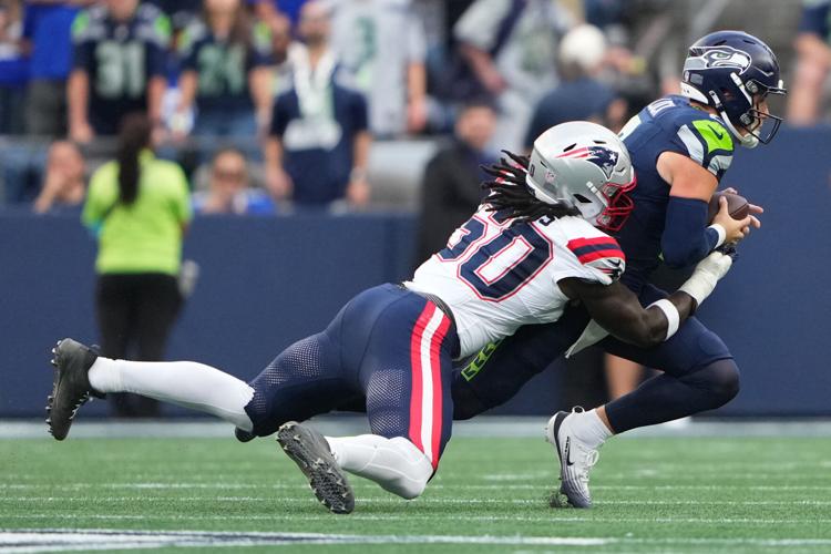 Photos of the NFL season opener, a rare Super Bowl rematch between the Seahawks and Patriots