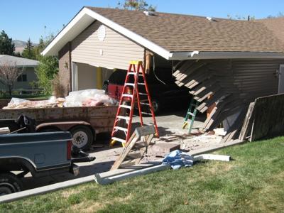 Car crashes into garage