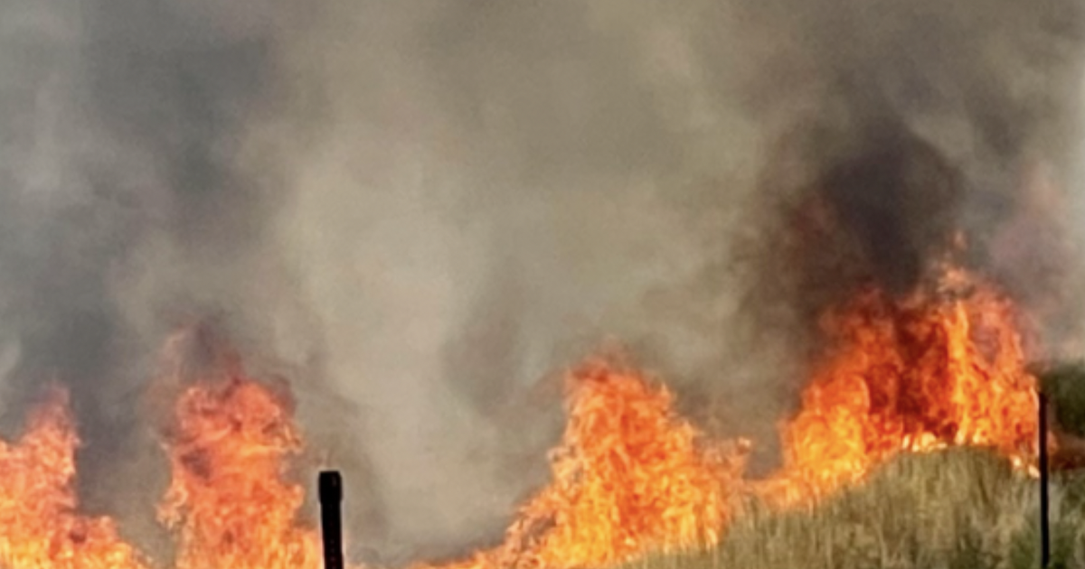 Firefighters battling brush fire along Michaud Creek Road near Pocatello Regional Airport