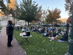 Activists stage Halloween 'die-in' against health care cuts