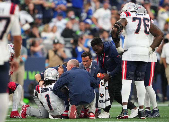 Photos of the NFL season opener, a rare Super Bowl rematch between the Seahawks and Patriots