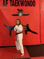 10-year-old student at American Falls Taekwondo earns black belt