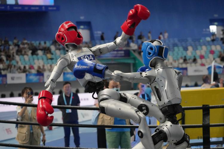 Humanoid robots sprint, play soccer and set records at Beijing games, in photos