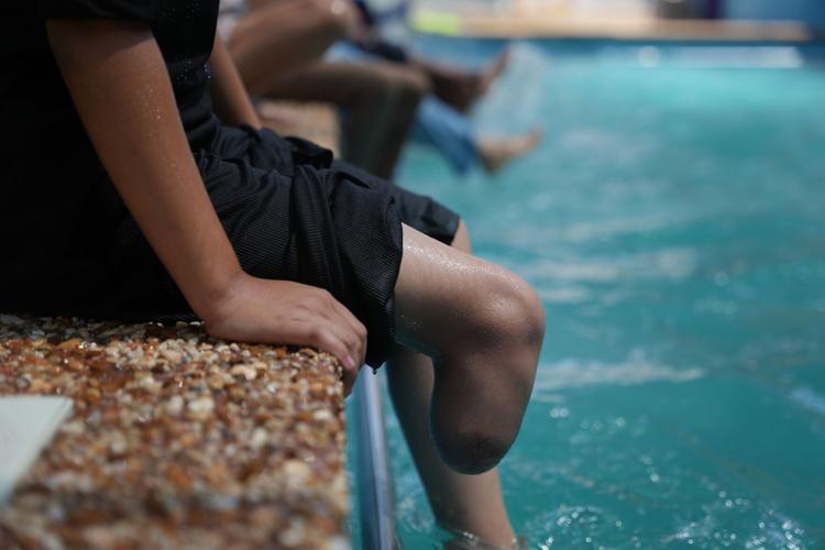 Palestinian children who lost limbs in the Israel-Hamas war learn to swim in Gaza