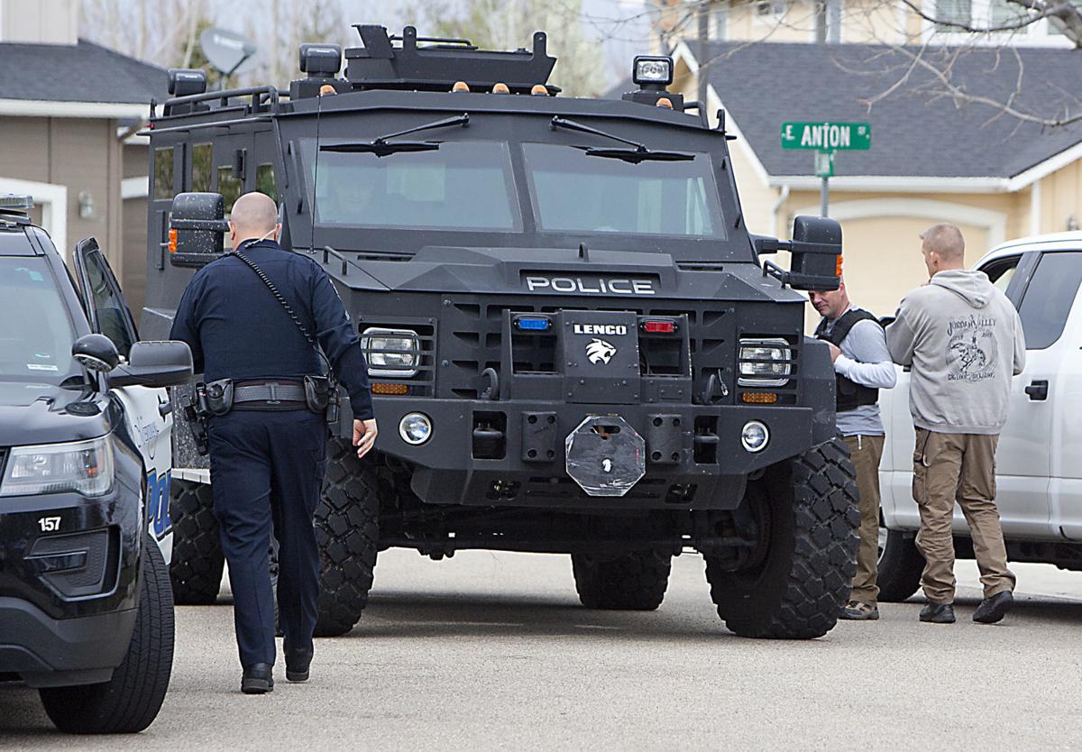 Three suspects charged in fatal shooting that led to standoff Local