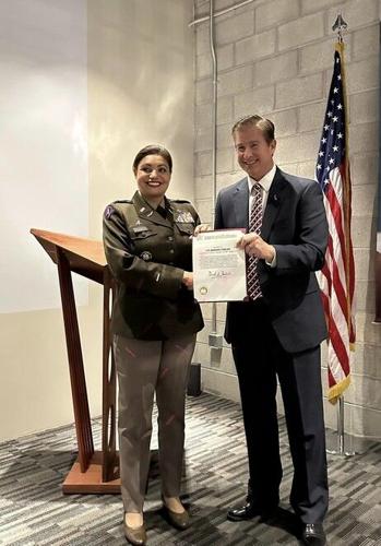 Supervisor David Haubert Commends Park Reserve Forces Training Area Garrison Commander Lt. Col. Marisol Chalas