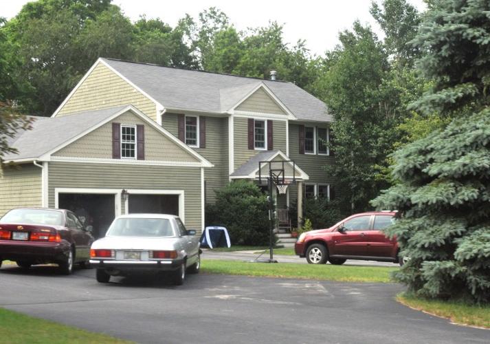 Homeowners sue tax official over property assessments East Greenwich