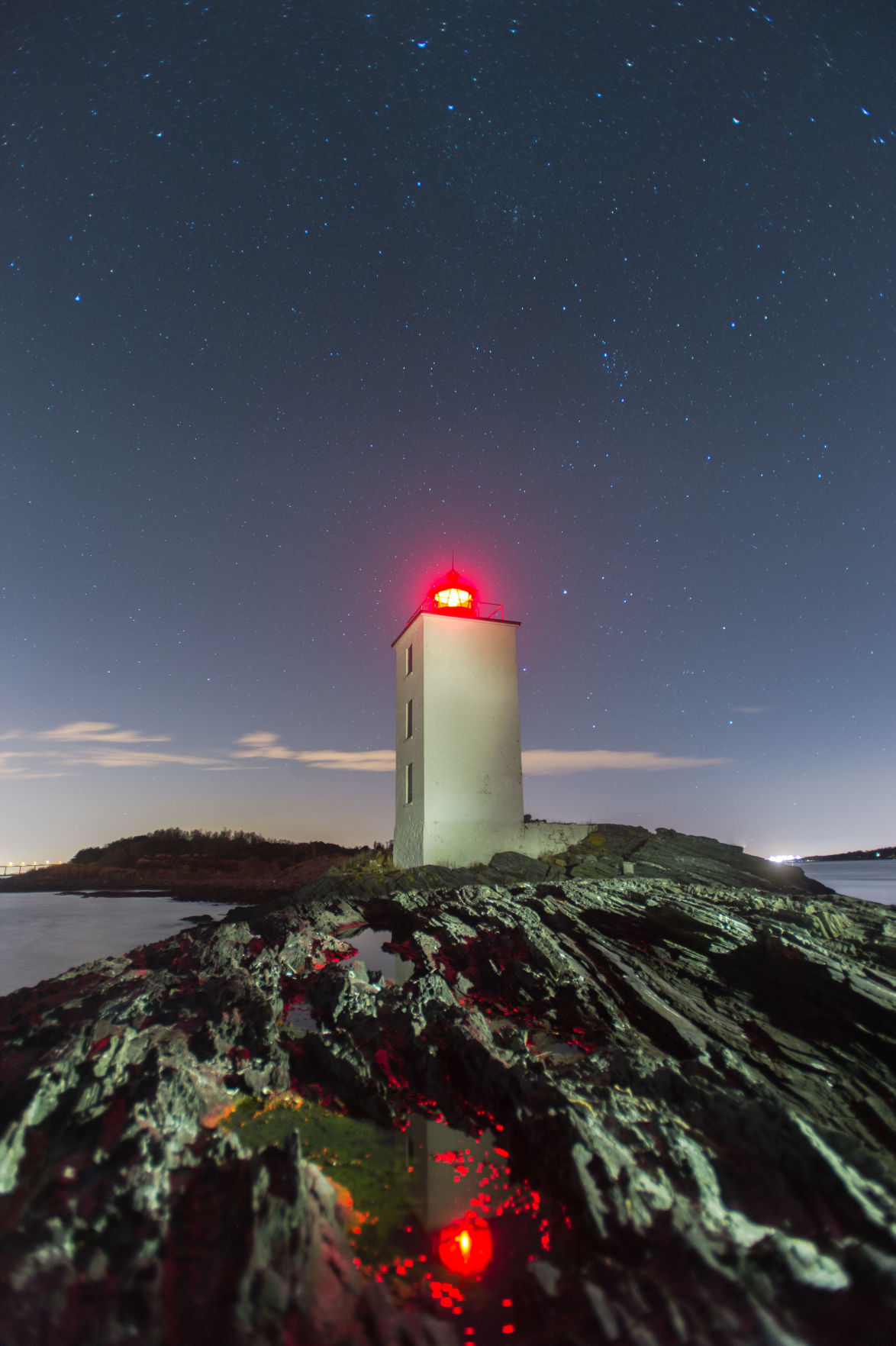 Local photographer captures the brilliance of lighthouses at night