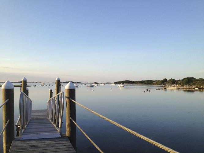 Cottage comforts Property on Quonochontaug Pond rich in character