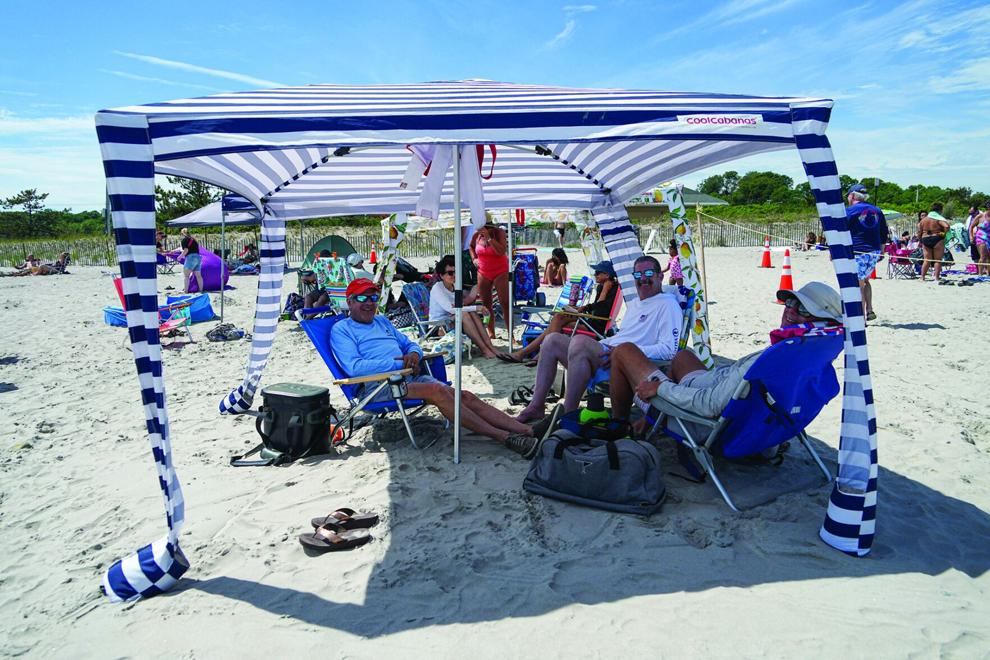 As weather heats up, beach umbrellas a hot topic in South County