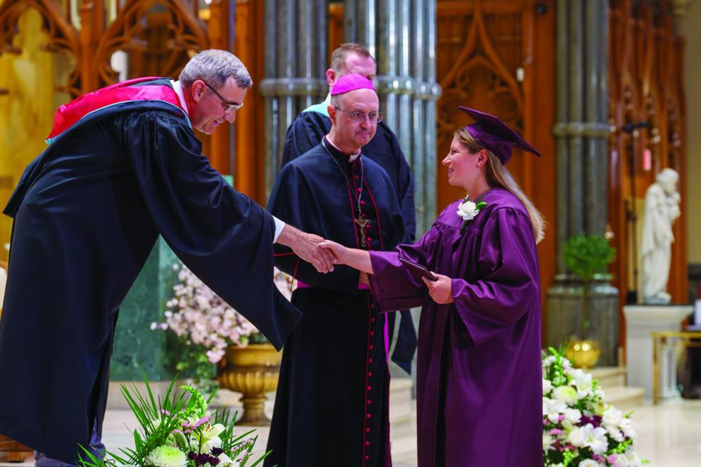 Prout School graduates reminded that they’ll always be Crusaders