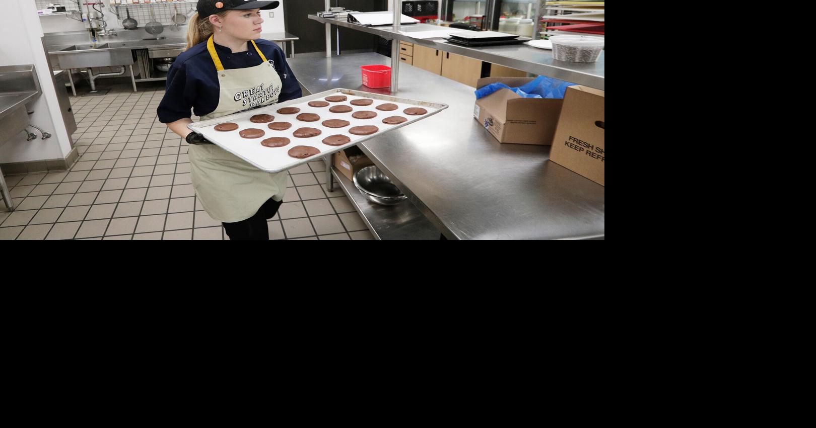 Local youths test their baking skills in The Great Startup Bakeoff and sell their treats at a holiday market