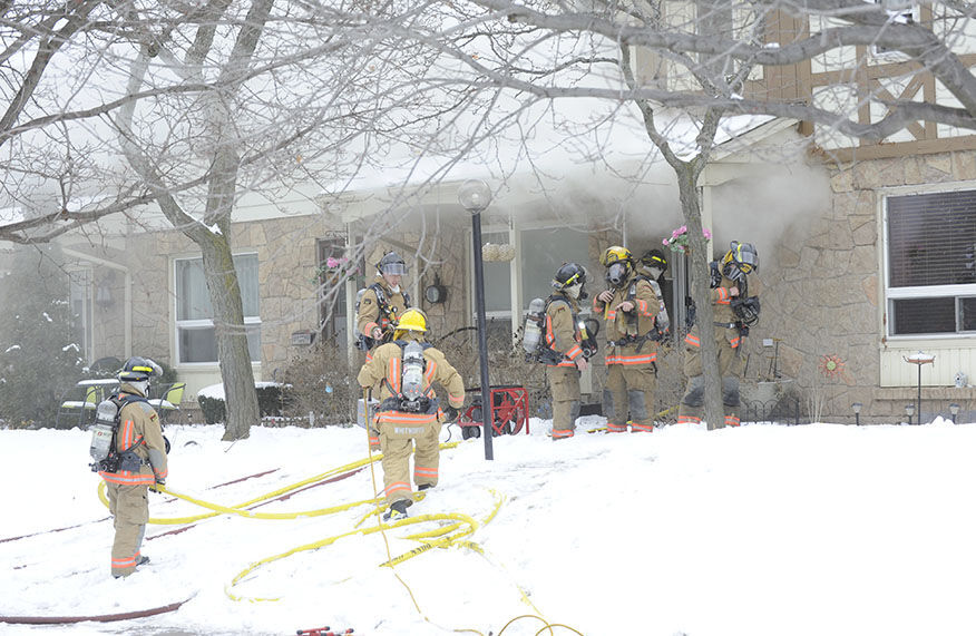 Firefighters Battle A Townhouse Fire In Burlington, Forces Evacuation ...