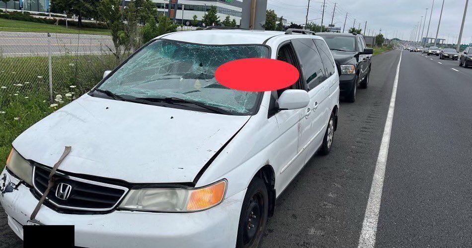 'That is crazy': Honda Odyssey driver on QEW in Oakville driving in traffic with shattered windshield and duct tape holding down hood - Vimarsana News