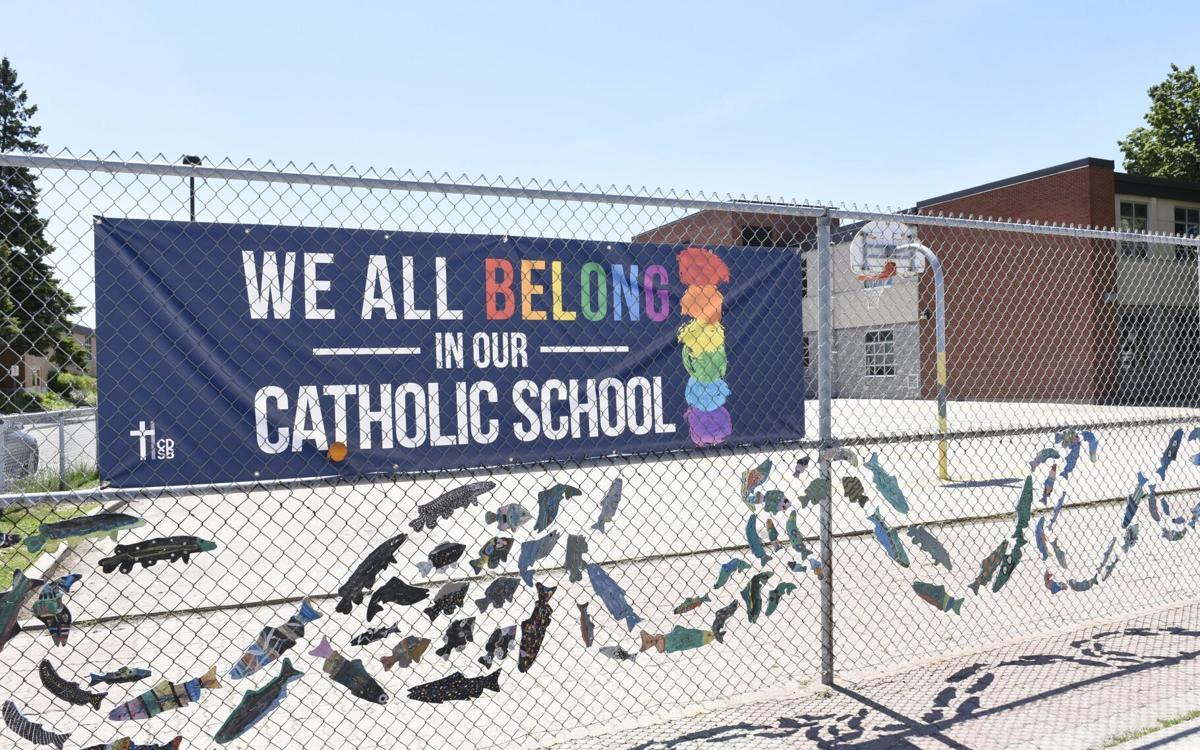 We All Belong rainbow banner