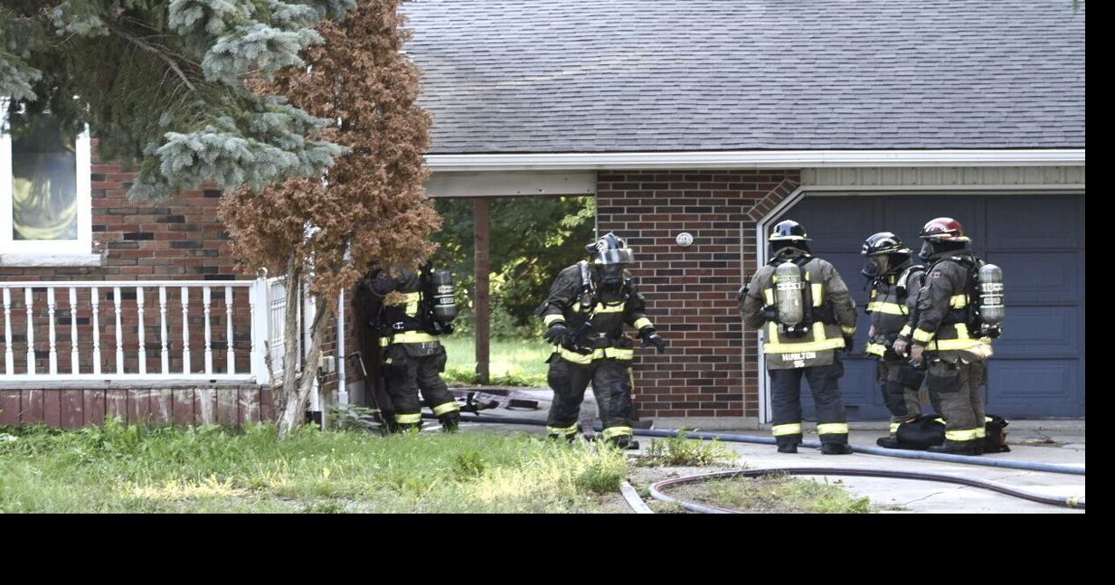 Several firefighters battling house fire in Milton