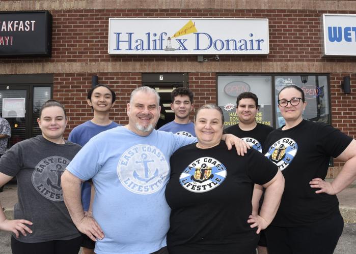Jim and Tina Tsouros and staff in front of Halifax Donair