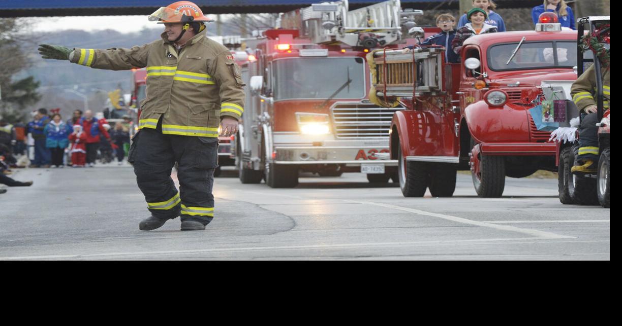 Santa’s helpers bring his parade to town