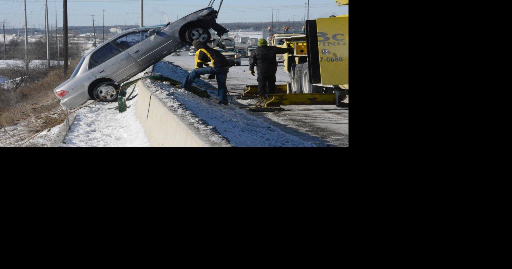 Driver escapes injury after car jumps guardrail on QEW