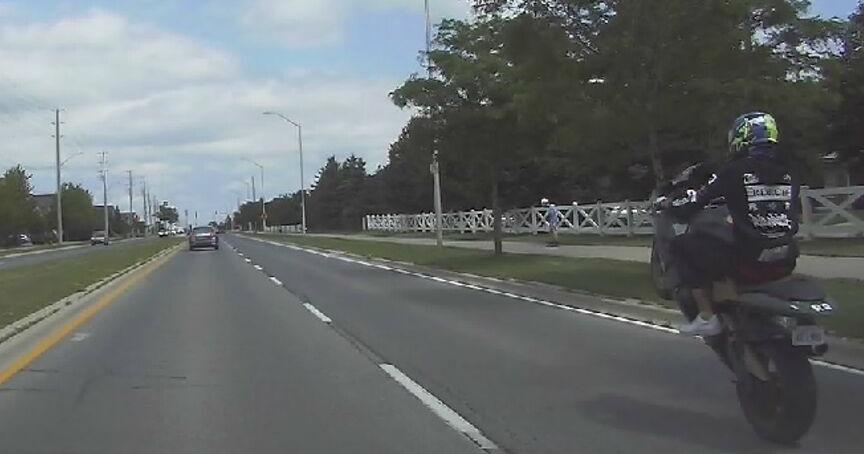 CAUGHT ON CAMERA: Stunt-driving Milton motorcyclist flees from police ...