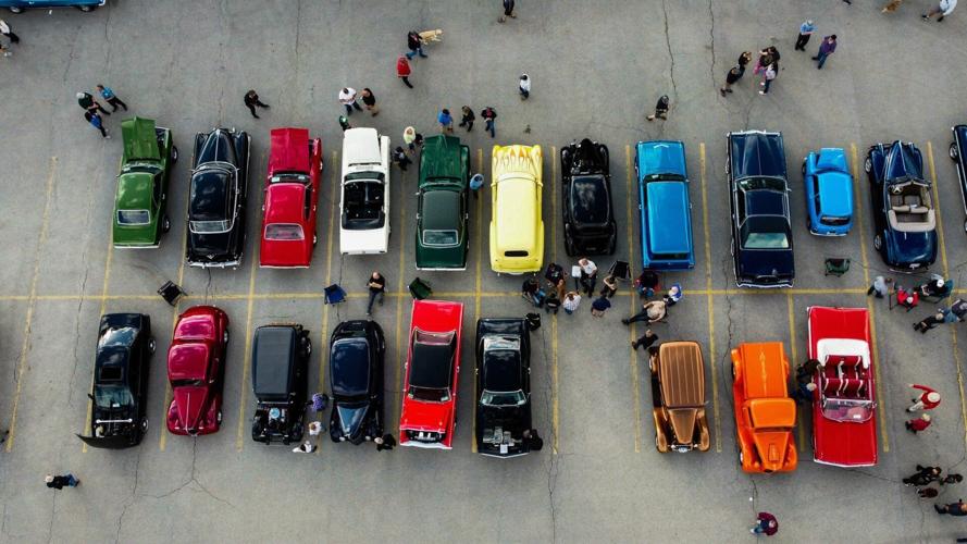 Aerial view of vintage cars in parking lot